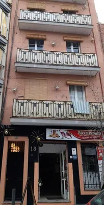 a pink building with balconies on top of it at Colour Pop FIRA by MyRentalHost in Hospitalet de Llobregat