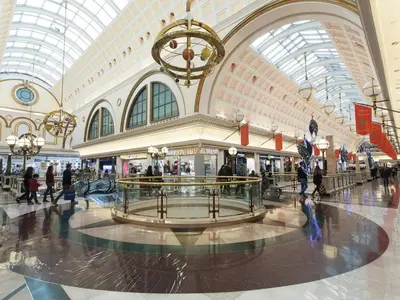a large shopping mall with people walking in it at Colour Pop FIRA by MyRentalHost in Hospitalet de Llobregat