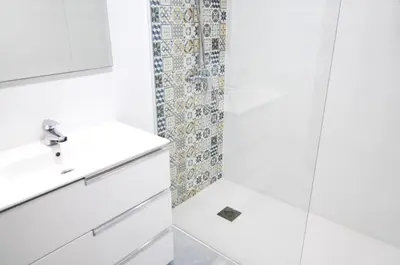 a bathroom with a sink and a shower at HomeHolidaysRentals SantMartin - Costa Barcelona in Calella
