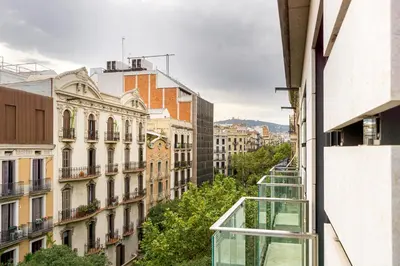 a view from a balcony of a city with buildings at Enjoy Apartments Maria II in Barcelona