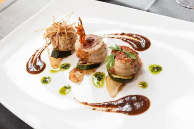a plate of food on a white plate at Hotel Best Front Maritim in Barcelona