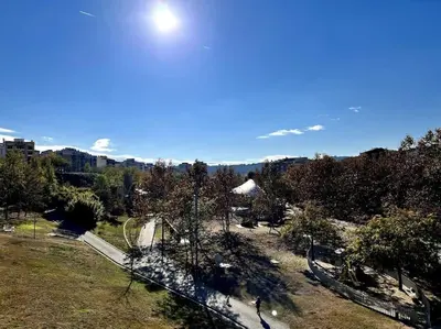 a view of a park with a roller coaster at Acogedor apartamento entero in Terrassa