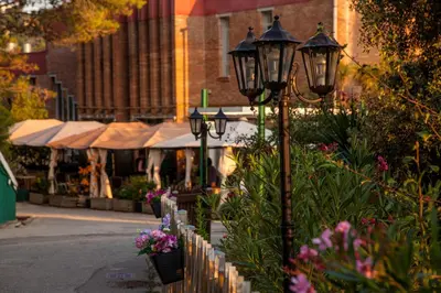 a group of lights on a street with flowers at Inout in Barcelona