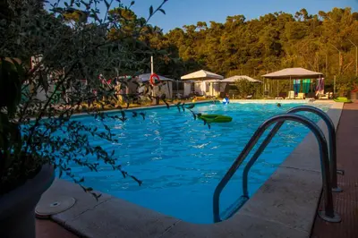a large swimming pool with a blue water at Inout in Barcelona