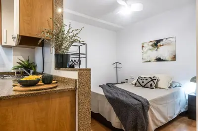 a kitchen with a bed in a room at Fantástico loft cerca centro by Lofties in Terrassa