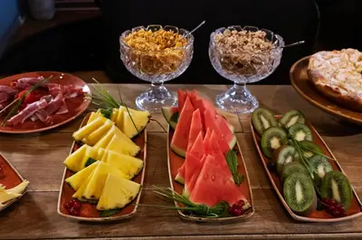 a table with three plates of different types of food at Chic & Basic Born Boutique Hotel in Barcelona