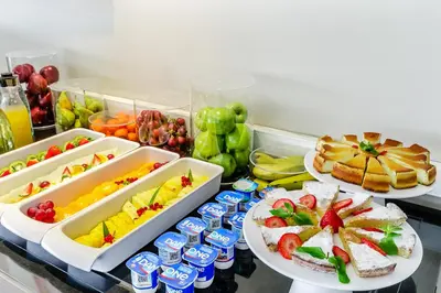 a refrigerator filled with different types of food and drinks at Exe Campus in Bellaterra