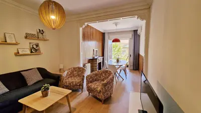 a living room with a couch and chairs and a table at Barcelona4Seasons - Sagrada Familia in Barcelona