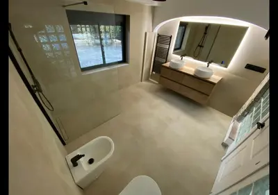 a bathroom with a sink and a mirror at Costa Maresme Barcelona , Relax & Pool in Cabrils