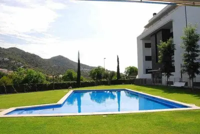 a swimming pool in the yard of a house at Sitges PORT - Con piscina, a 5 minutos de la playa in Sitges