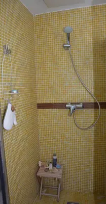 a bathroom with a shower with a table in it at Villa Sitges Julia Vista Espectacular 2 k m s de la Playa Comoda & Area Tranquila Amplitud interior y plana in Sitges