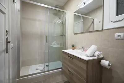 a bathroom with a shower and a sink at BBarcelona Calabria Flat in Barcelona