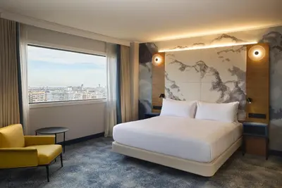 a bathroom with a sink and a toilet and a shower at Hilton Barcelona in Barcelona