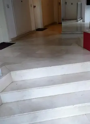 a set of stairs in a room with a floor at Studio doria in Sant Boi del Llobregat