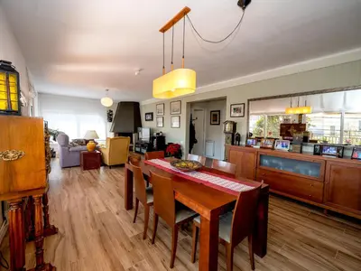 a kitchen and dining room with a table and chairs at Apartment Millenium by Interhome in Premia de Dalt