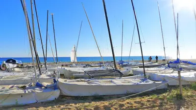 a bunch of boats sitting on the beach at EMILY BEACH-CITY Apartment in Montgat