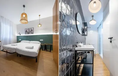 an empty hallway with white walls and wood floors at BeBarceloner Eixample Apartments - 4 bedrooms in Barcelona