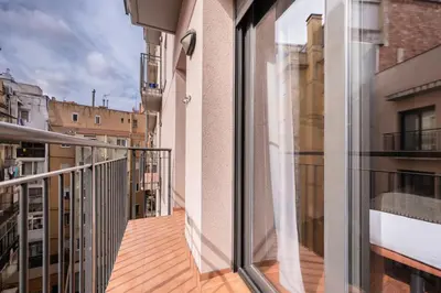 a balcony with a view of buildings at Sweett - Casa Roma in Barcelona