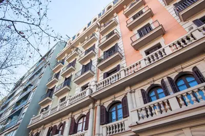 a tall building with balconies on the side of it at P2PAR1002 - Super Bright & New Apartment in the city center in Barcelona