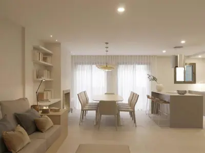 a living room with a couch and a table at Sitges Spaces Bonaire Beach Condo in Sitges
