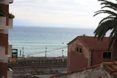 a view of the ocean from a building at Cal Negre 2 in Vilassar de Mar