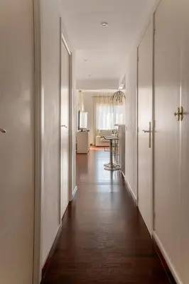 an empty room with a large window on the wall at The Collection Barcelona - Eixample - Bright and modern 4BD only for Families or Business groups in Barcelona