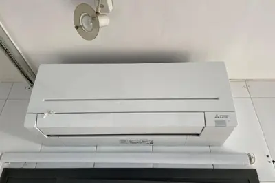 a white printer sitting on top of a wall at Apartment with sea views next to the beach of Mar Bella in Barcelona